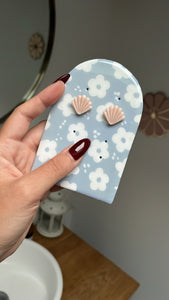 Puces d'oreilles coquillage